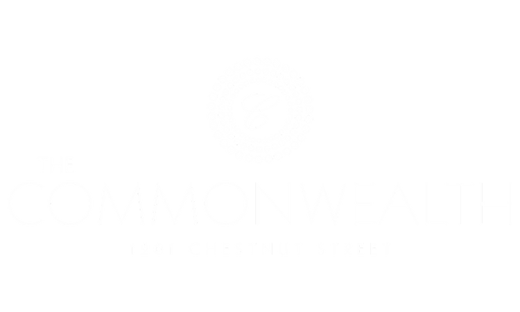 The logo of The Commonwealth on a black background.